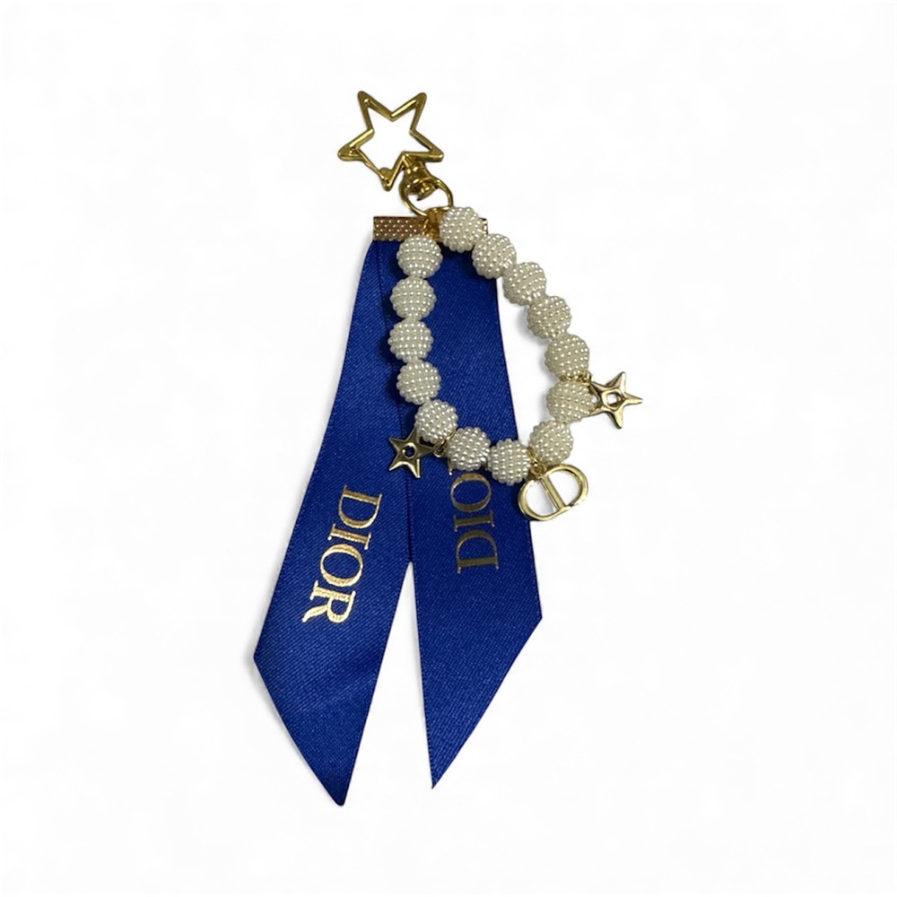 New in Box Dior GWP Gold Star Faux Pearl key chain w/ Blue Ribbon CD Bag Charm - Picture 2 of 3